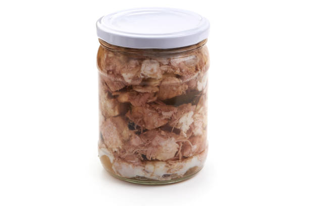 istock Canned meat in a glass jar, isolated on white background. 2178431802