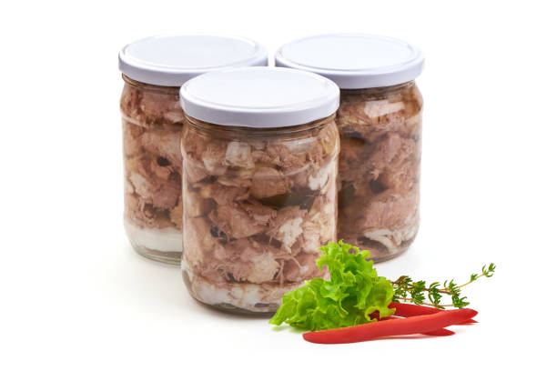 istock Canned meat in a glass jar, isolated on white background. 2178431975