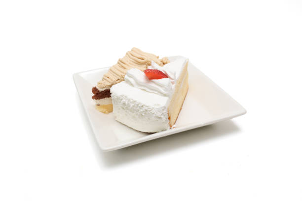 Chestnut cream cake and strawberry sponge cake isolated on a white background.