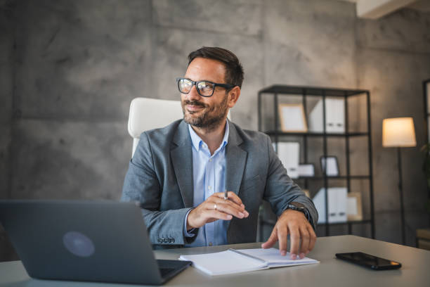 istock confident businessman work on new project on notebook in modern office 2178436923
