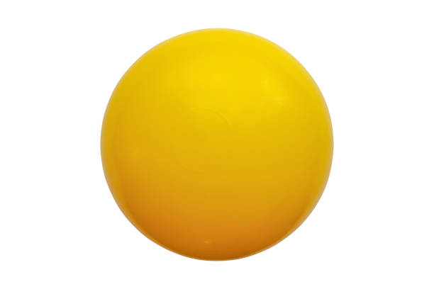 Yellow plastic ball isolated on white background
