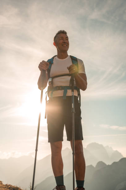 istock Mature Asian Man Trekking on a Sunny Day 2178443508