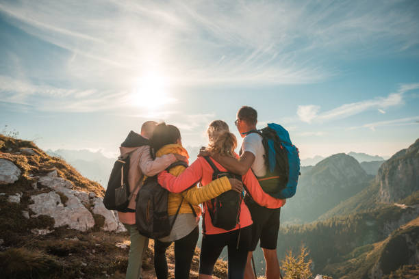 istock Diverse Group Embracing and Enjoying Sunny Mountain Day 2178443517