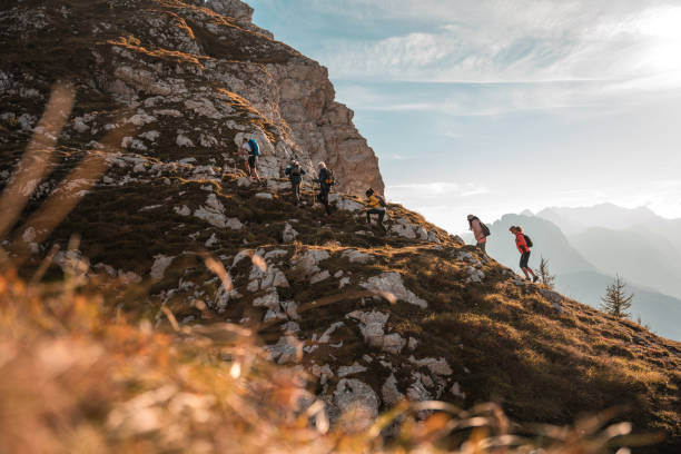 istock Diverse Group Having Fun Trekking Mangart Saddle on a Sunny Day 2178443518