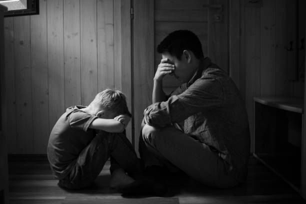 istock Sad father parent and child at home, family problems, divorce, difficulties. 2178445084