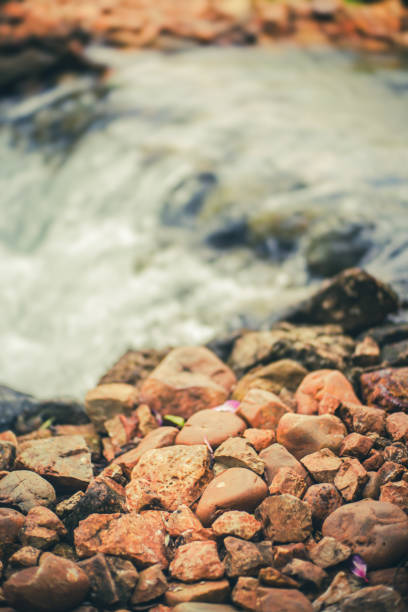 A waterfall meets the Atlantic Ocean.