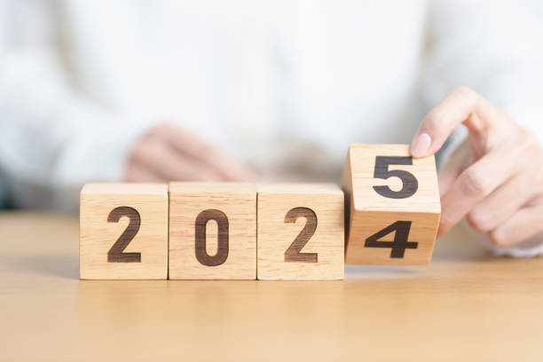 istock 2024 change to 2025 year block on table. goal, Resolution, strategy, plan, start, budget, mission, action, motivation and New Year concepts 2178461475