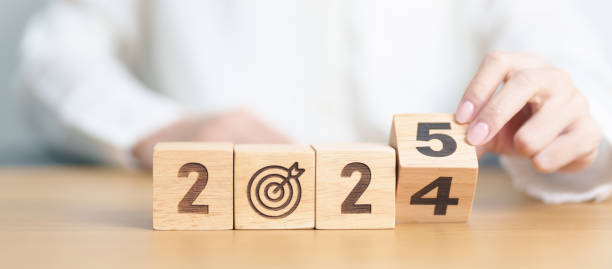 istock 2024 year change to 2025 year block with dartboard icon. Goal, Target, Resolution, strategy, plan, Action, mission, motivation, and New Year start concepts 2178461482