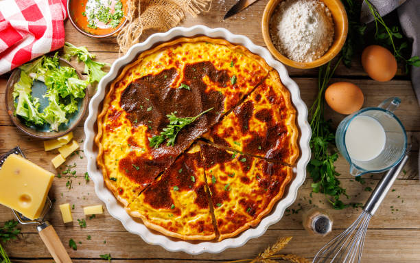 istock savory traditional lorraine quiche on wood background 2178462055