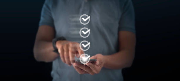 istock Musinessman checking quality assurance QA or QC management, certification Standardization, certification. Compliance to regulations service and standards. 2178462637