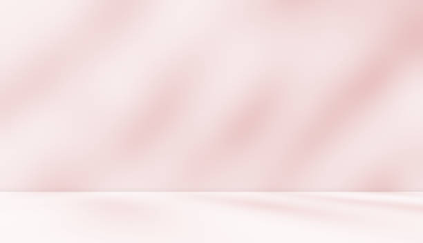 istock Empty pink colour room studio with sunlight effect shadow on the floor and wall for product presentation. 2178463365