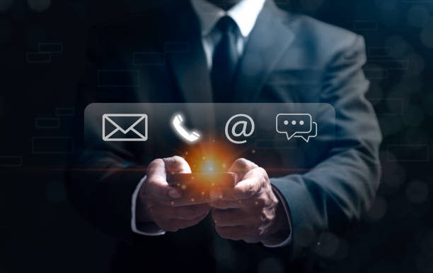 istock Businessman using smartphone with the email, call phone, address, Chat message icons. Customer support hotline Contact us people connection. 2178463793