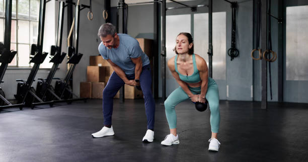 istock Sport Workout In Gym. Kettlebell Swing 2178465108