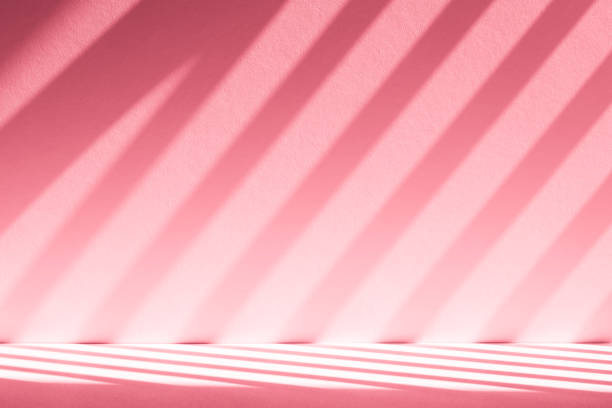 istock Wall interior background, studio, and backdrops show products. with shadow from window color white and pink light. background for text insertion and presentation of product 2178466134