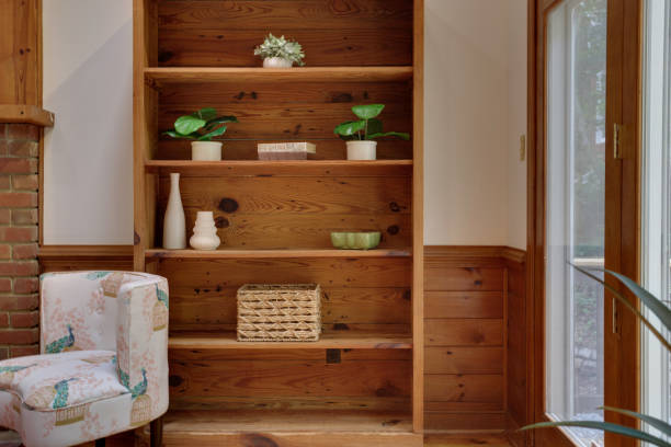 Cozy Wooden Bookshelf By Sunlit Window Corner