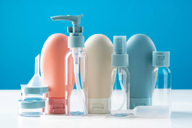 istock Variety of travel-sized containers displayed against a bright blue background 2178471218