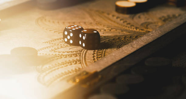 istock Wooden backgammon board with dice and pieces 2178476276