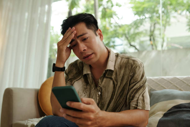 istock Man Reading Bad Message On The Phone 2178477614