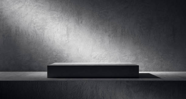 istock Minimalist pedestal display on a dark concrete background for product presentation. 3D Rendering 2178478239