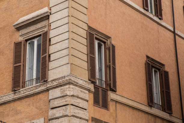 View of the facade of an old house in Rome, Italy