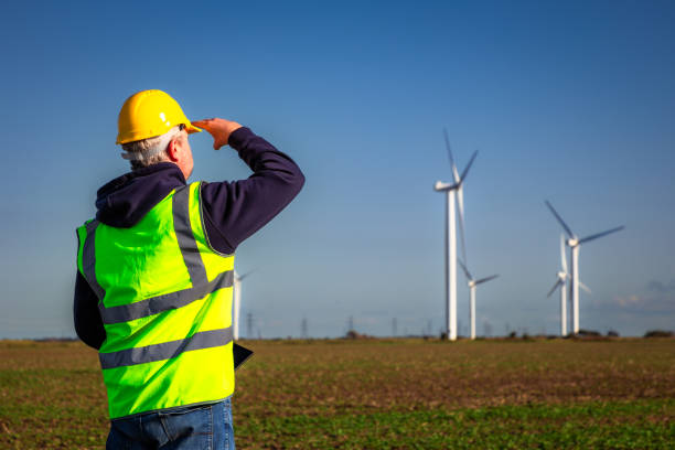 istock Maintenance engineer working at the wind farm 2178480829