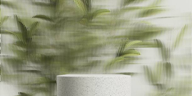 istock 3D rendering of a podium displaying vibrant tropical plants in a sleek, minimalist design behind ribbed glass. 2178482295