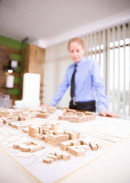 istock Middle age female arhitect working on a real estate project 2178482825