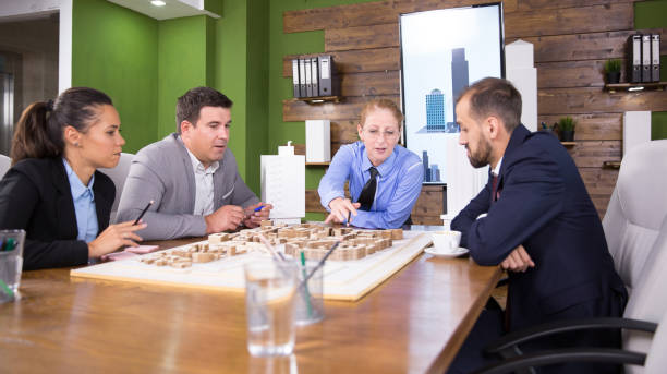 istock Middle age female architect in a meeting with real estate developers 2178483215