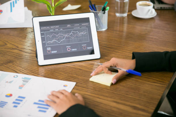 istock Tablet with charts in the coferene room 2178484189