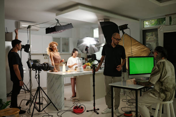 istock Team Of Operators And Photographers Working In Studio 2178485188