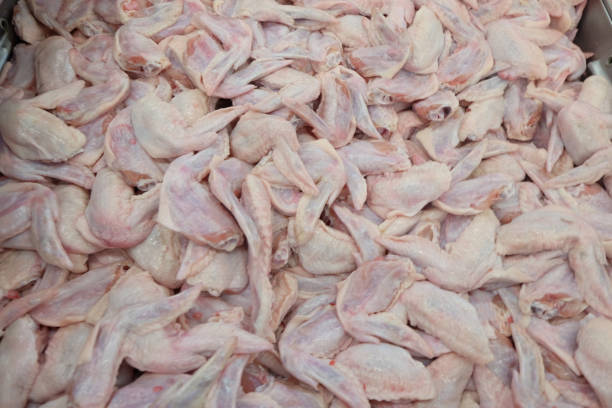 istock Close-Up View of Fresh Chicken Wings in Bulk 2178485810