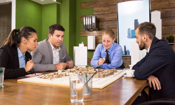 istock Team of architcts discussing their new real estate project 2178486222