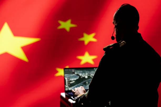 istock Chinese air defense operator using radar system on laptop to detect missiles 2178486414