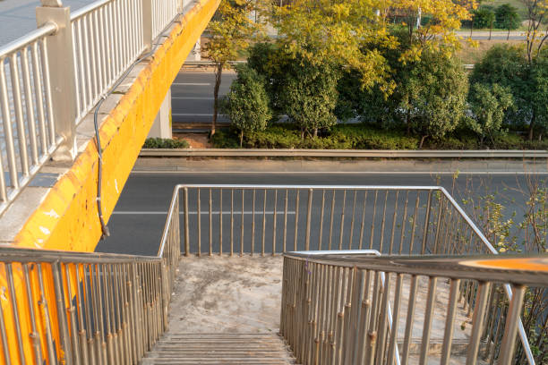 Concrete structure and asphalt road space under the overpass in the city