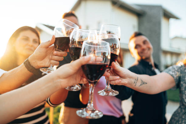 istock people toasting outdoors 2178491945