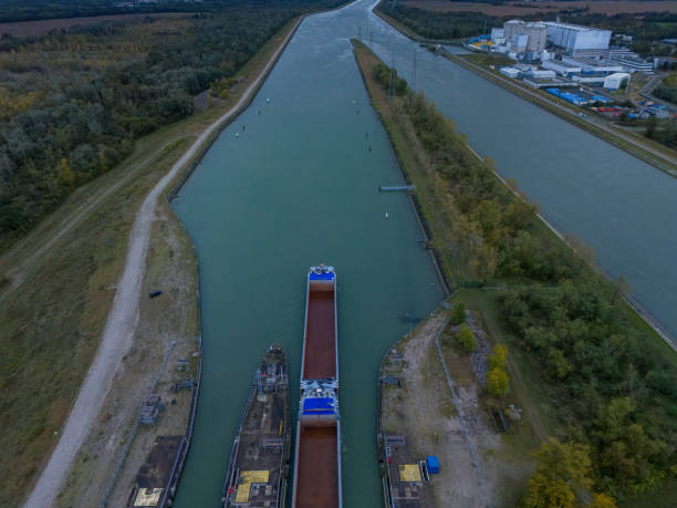 istock Aerial View of Cargo Vessel in Canal Lock System 2178493353