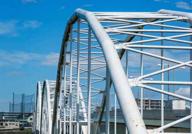 On a sunny day in September 2024, the Tamagawara Aqueduct runs parallel to the Tamagawara Bridge, which stretches from Inagi City to Chofu City in Tokyo.