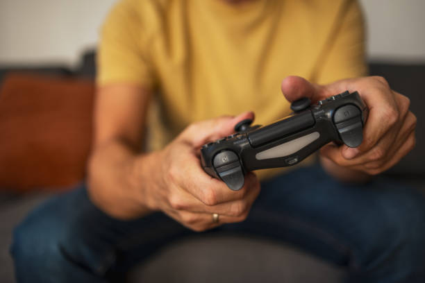 Close up of man playing games in his free time