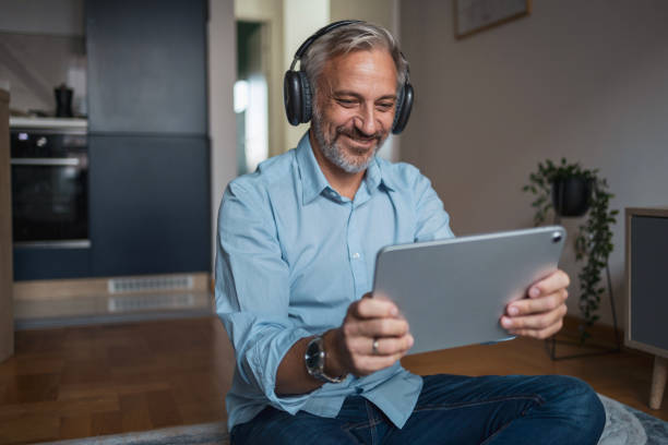 istock Mature man using digital tablet to listen a music 2178498002