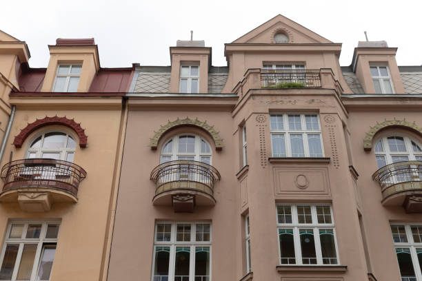 istock An impressively large building that features many windows and balconies 2178500424