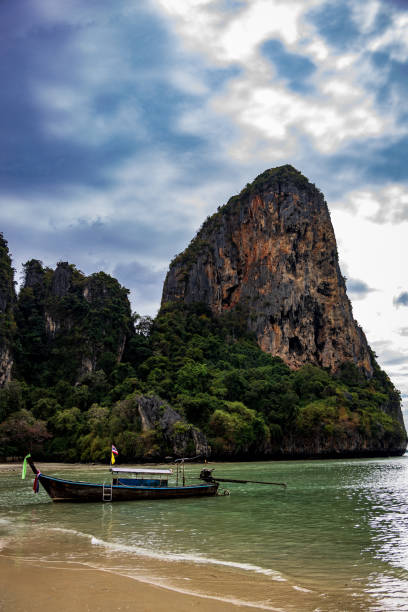Long tail boat at Railay Beach (Saray Beach), Ao Nang, Thailand, waiting for passengers.