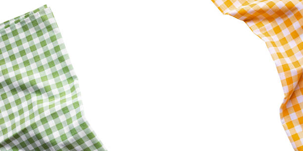 istock Vibrant arrangement of gingham-patterned fabrics in yellow, green tones, displayed isolate on a white background.Perfect for design textile 2178504586