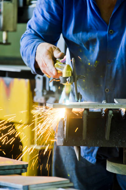 istock Man Working in a Metalworking Shop 2178511676