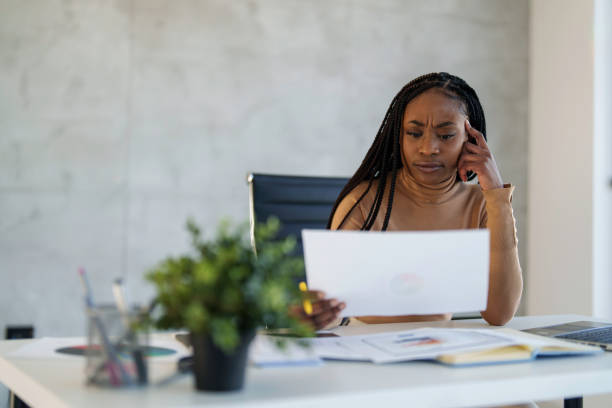 istock Focused Black Businesswoman Working in Modern Office 2178513287