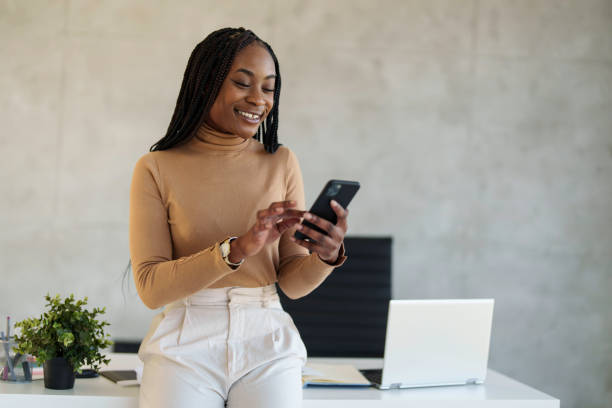 istock Engaged Black Businesswoman Using Smartphone in Office 2178513296