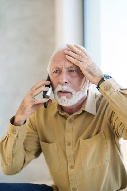 istock Concerned Senior Businessman on Phone Call 2178513498