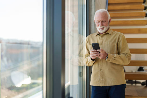 istock Senior Business Executive Engaging with Technology 2178513551