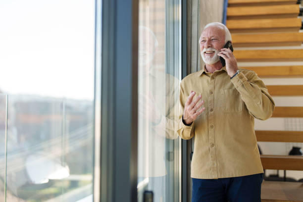 istock Senior Businessman Engaged in Phone Conversation 2178513552