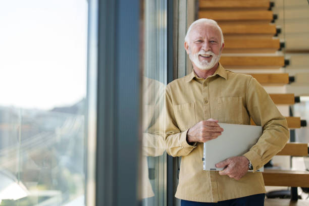 istock Senior Business Executive with Laptop in Office 2178513554