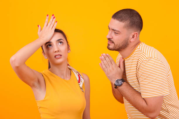 istock Boyfriend asking for forgiveness from his beautiful girlfriend 2178515175